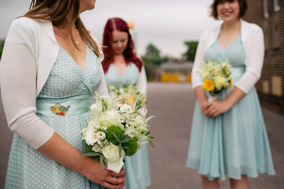 Sarah wears a 1950's inspired dress for her rustic wedding at Danby Castle in North Yorkshire. Photography by Stott & Atkinson.