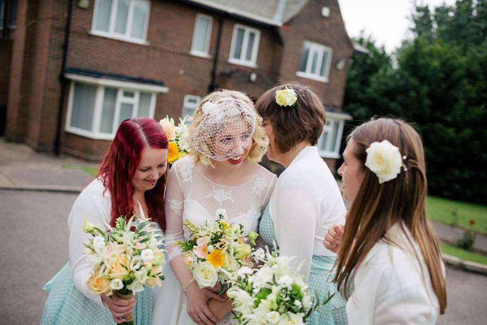 Sarah wears a 1950's inspired dress for her rustic wedding at Danby Castle in North Yorkshire. Photography by Stott & Atkinson.