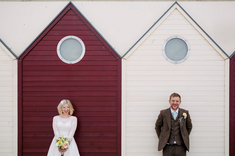 Sarah wears a 1950's inspired dress for her rustic wedding at Danby Castle in North Yorkshire. Photography by Stott & Atkinson.