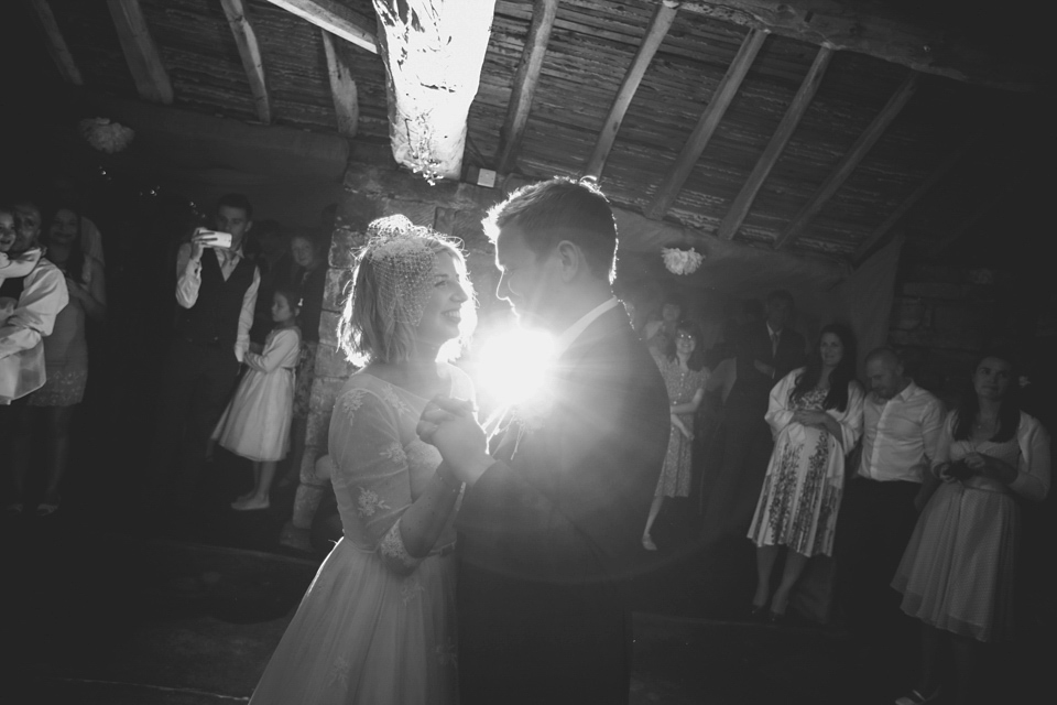 Sarah wears a 1950's inspired dress for her rustic wedding at Danby Castle in North Yorkshire. Photography by Stott & Atkinson.