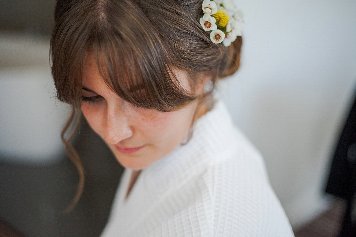 Abigail wore a backless Pronovias gown for her colourful Summer wedding at Shustoke Barn. Photogrpahy by Ria Beth.