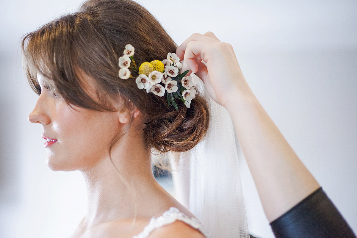 Abigail wore a backless Pronovias gown for her colourful Summer wedding at Shustoke Barn. Photogrpahy by Ria Beth.