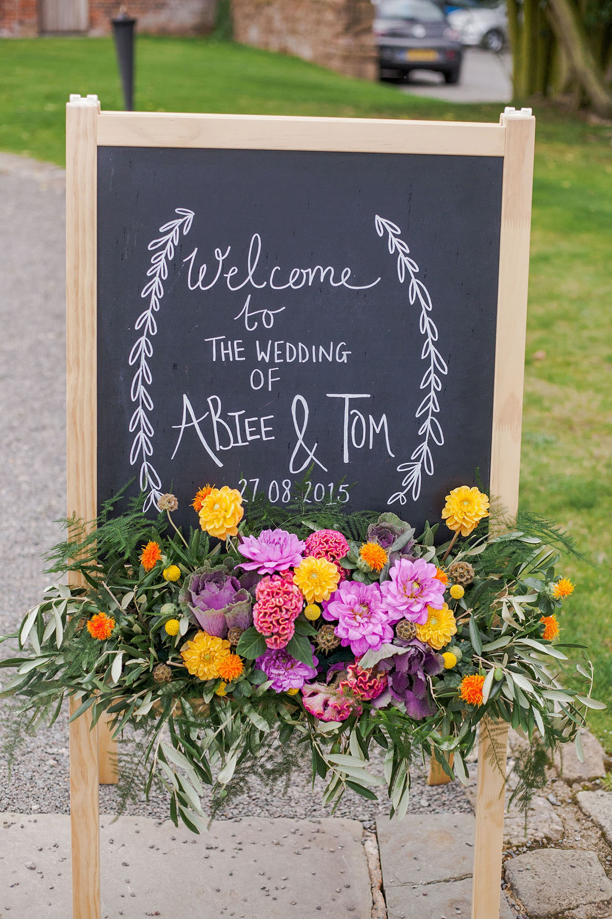 Abigail wore a backless Pronovias gown for her colourful Summer wedding at Shustoke Barn. Photogrpahy by Ria Beth.