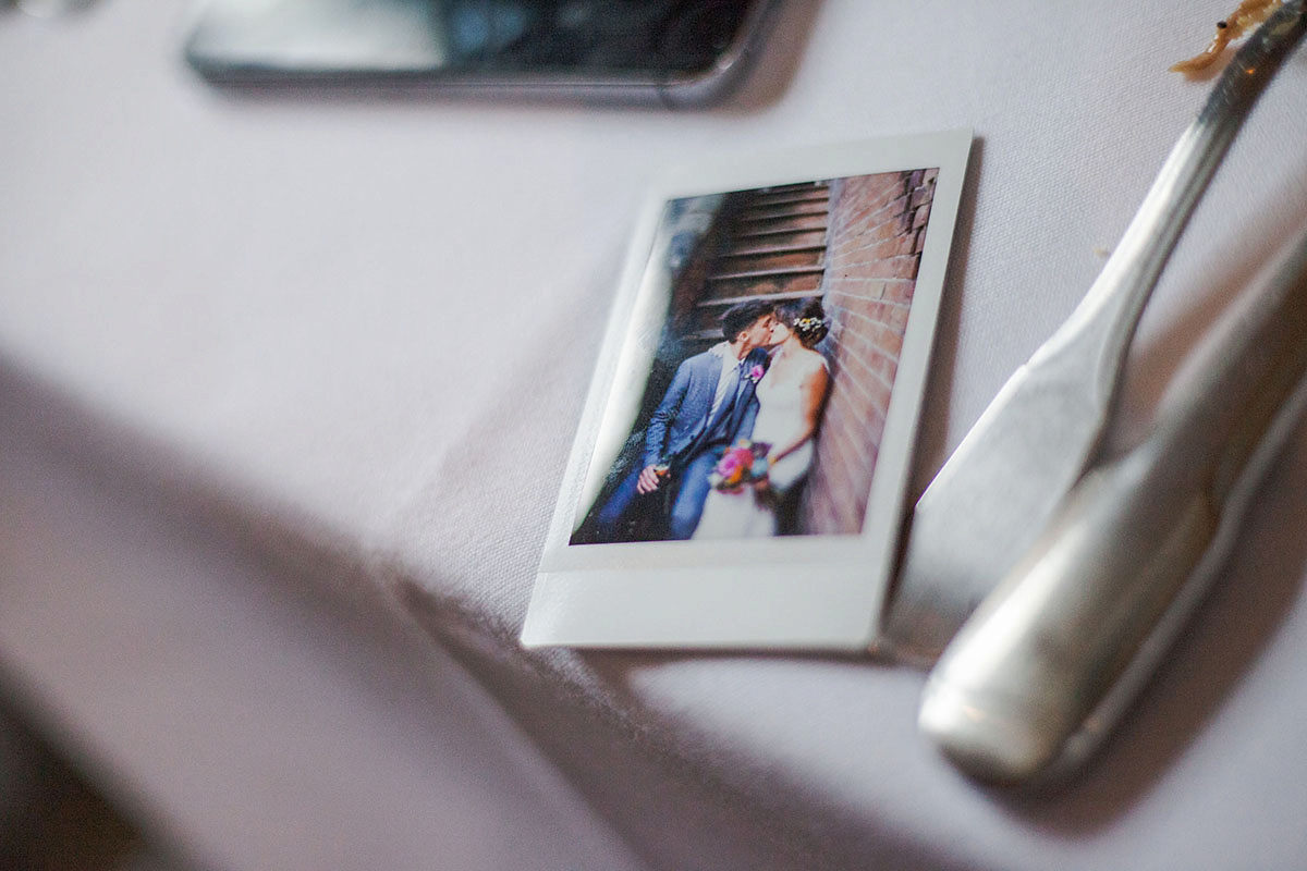 Abigail wore a backless Pronovias gown for her colourful Summer wedding at Shustoke Barn. Photogrpahy by Ria Beth.