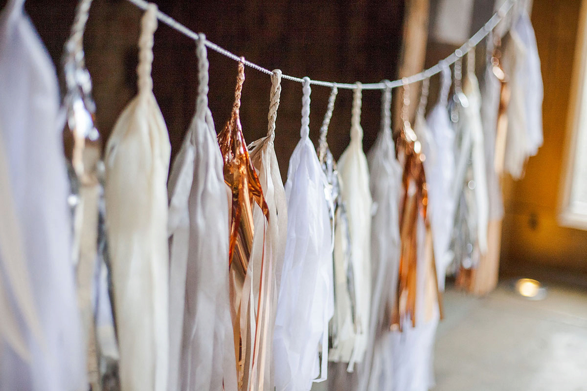 Abigail wore a backless Pronovias gown for her colourful Summer wedding at Shustoke Barn. Photogrpahy by Ria Beth.