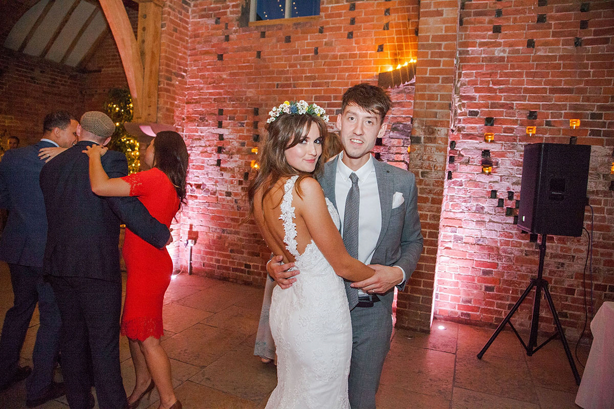 Abigail wore a backless Pronovias gown for her colourful Summer wedding at Shustoke Barn. Photogrpahy by Ria Beth.