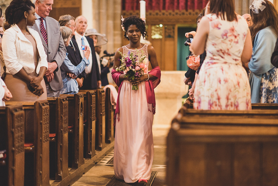 A beautiful bride wearing glasses and an Alfred Angelo gown for her Christian wedding. Photography by Matt Penberthy.