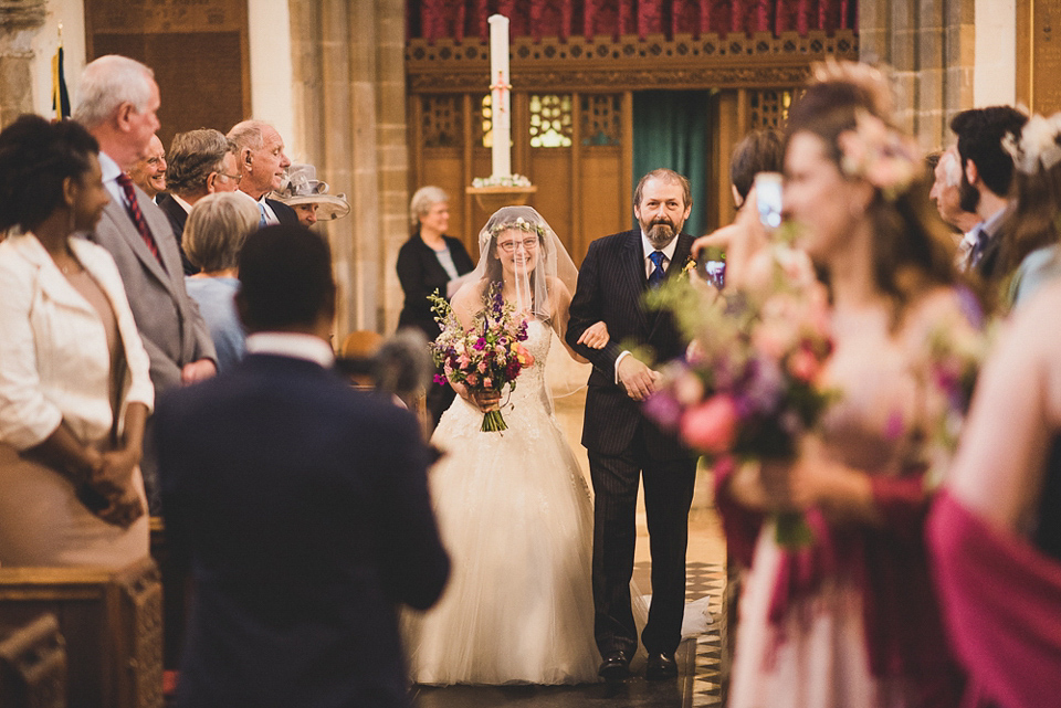 A beautiful bride wearing glasses and an Alfred Angelo gown for her Christian wedding. Photography by Matt Penberthy.