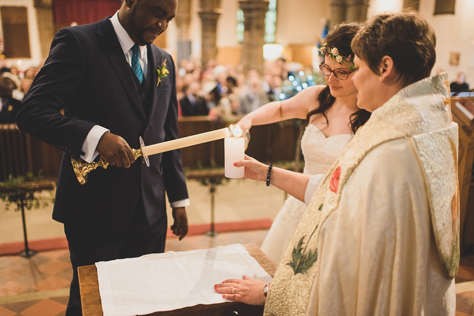 A beautiful bride wearing glasses and an Alfred Angelo gown for her Christian wedding. Photography by Matt Penberthy.