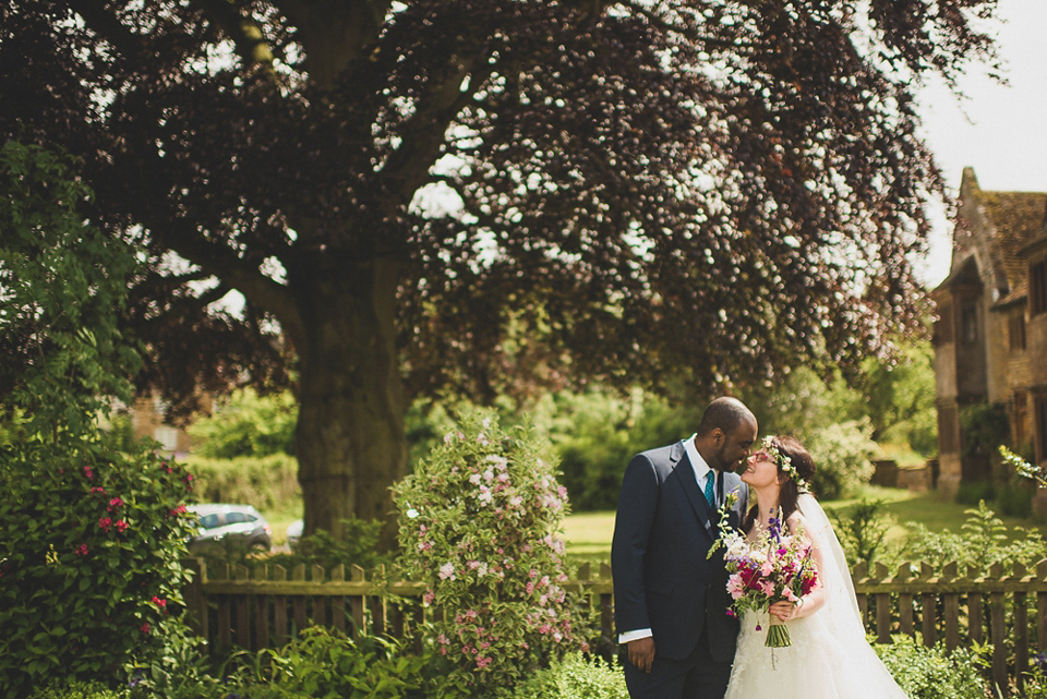 A beautiful bride wearing glasses and an Alfred Angelo gown for her Christian wedding. Photography by Matt Penberthy.