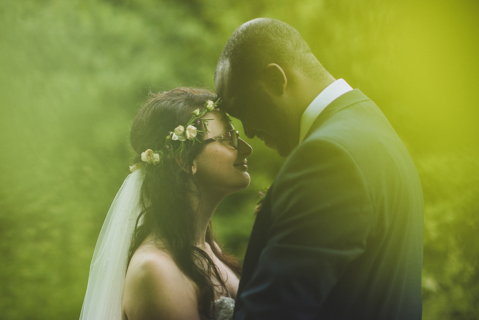 A beautiful bride wearing glasses and an Alfred Angelo gown for her Christian wedding. Photography by Matt Penberthy.