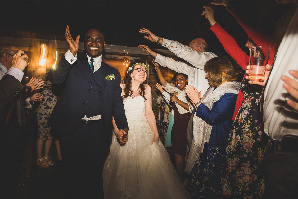 A beautiful bride wearing glasses and an Alfred Angelo gown for her Christian wedding. Photography by Matt Penberthy.