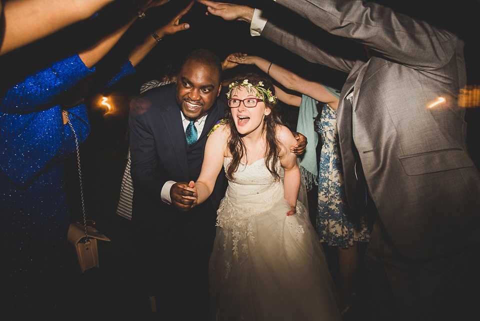 A beautiful bride wearing glasses and an Alfred Angelo gown for her Christian wedding. Photography by Matt Penberthy.