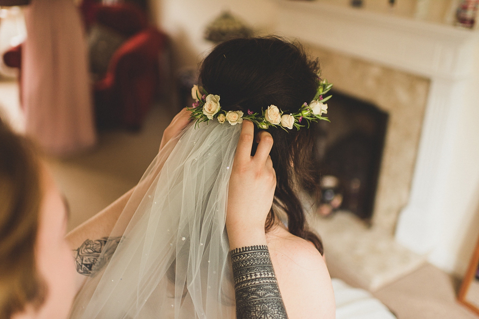 A beautiful bride wearing glasses and an Alfred Angelo gown for her Christian wedding. Photography by Matt Penberthy.