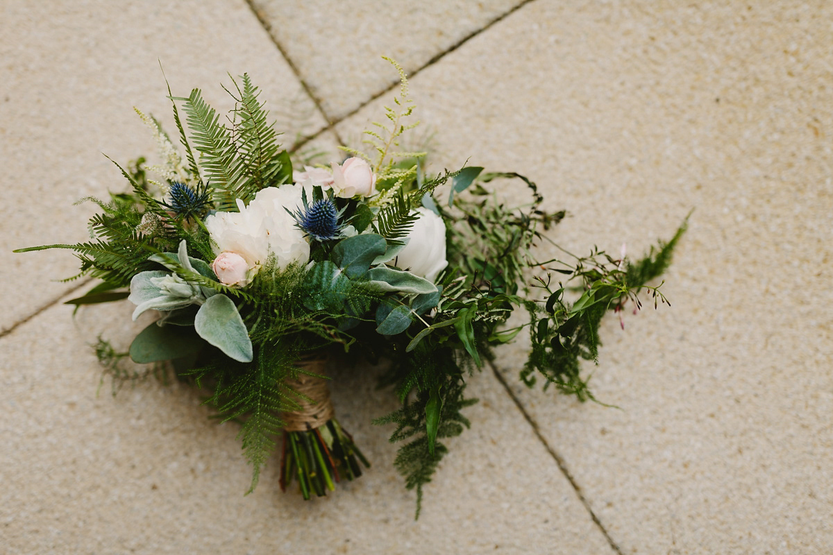 Alice wears a Downton Abbey inspired beaded gown by Eliza Jane Howell for her Suffolk countryside wedding. Photography by Andy Davison.