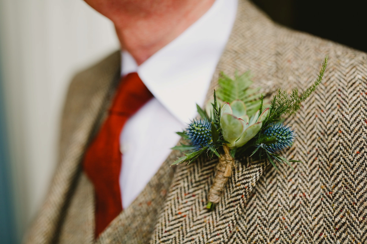 Alice wears a Downton Abbey inspired beaded gown by Eliza Jane Howell for her Suffolk countryside wedding. Photography by Andy Davison.