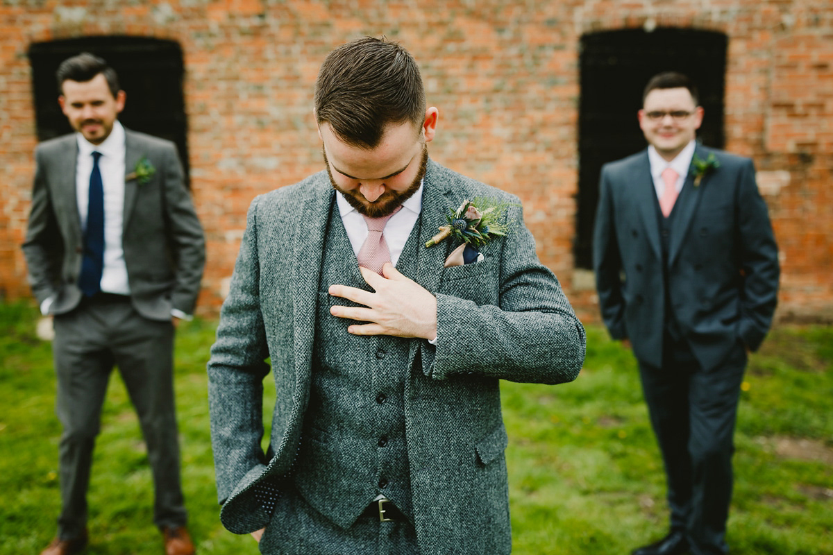 Alice wears a Downton Abbey inspired beaded gown by Eliza Jane Howell for her Suffolk countryside wedding. Photography by Andy Davison.