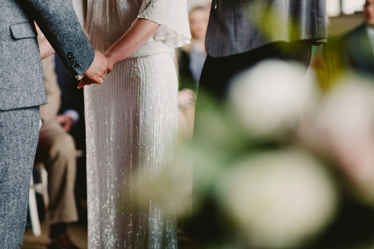 Alice wears a Downton Abbey inspired beaded gown by Eliza Jane Howell for her Suffolk countryside wedding. Photography by Andy Davison.