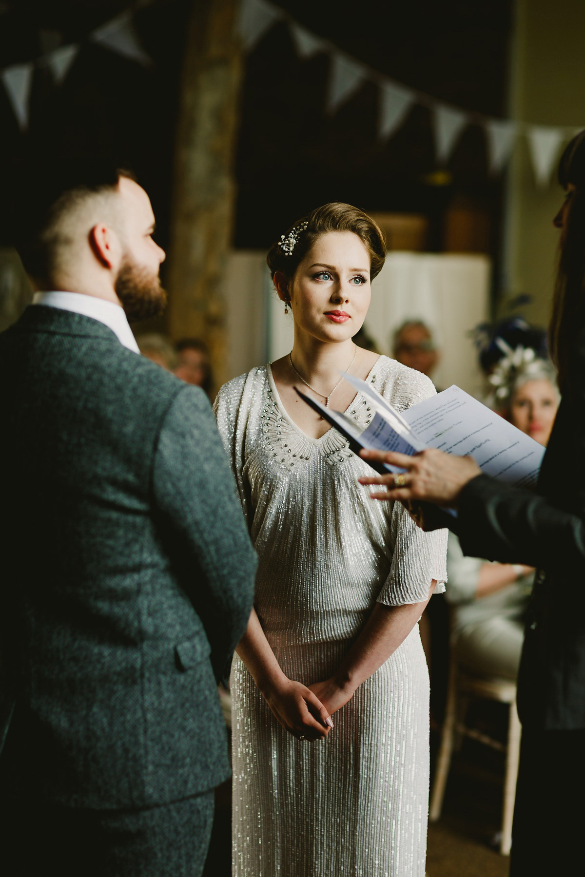 Alice wears a Downton Abbey inspired beaded gown by Eliza Jane Howell for her Suffolk countryside wedding. Photography by Andy Davison.