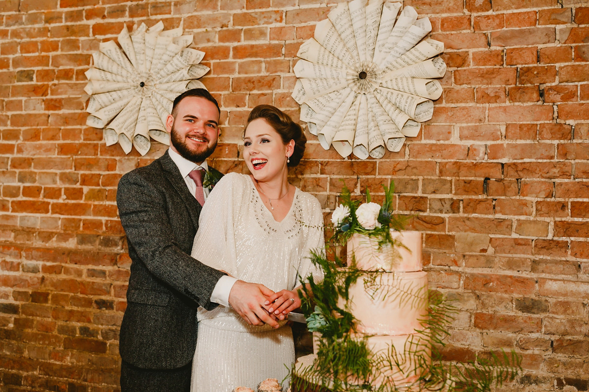 Alice wears a Downton Abbey inspired beaded gown by Eliza Jane Howell for her Suffolk countryside wedding. Photography by Andy Davison.