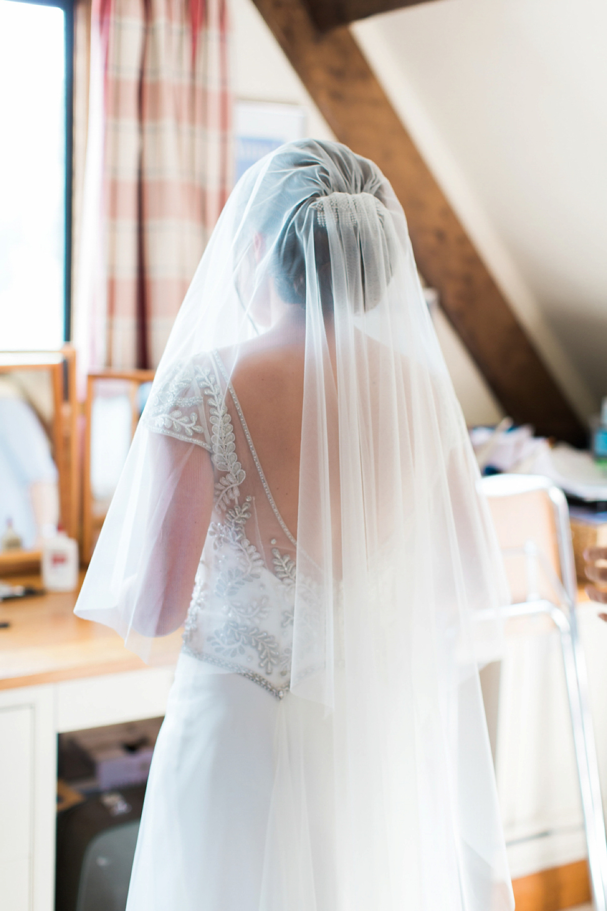 Sarah wore a Halfpenny London gown for her elegant English country garden wedding.  Photography by Helen Cawte.