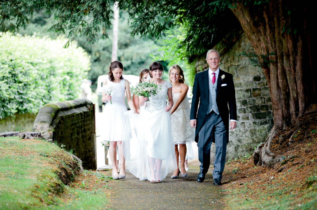 Sarah wore a Halfpenny London gown for her elegant English country garden wedding.  Photography by Helen Cawte.