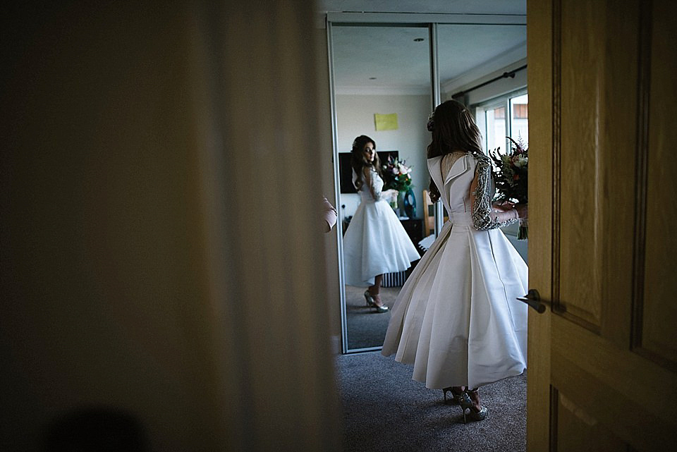 Karen wore a wedding dress with epaulettes for her Irish castle wedding in the Autumn. Photography by Epic Love.