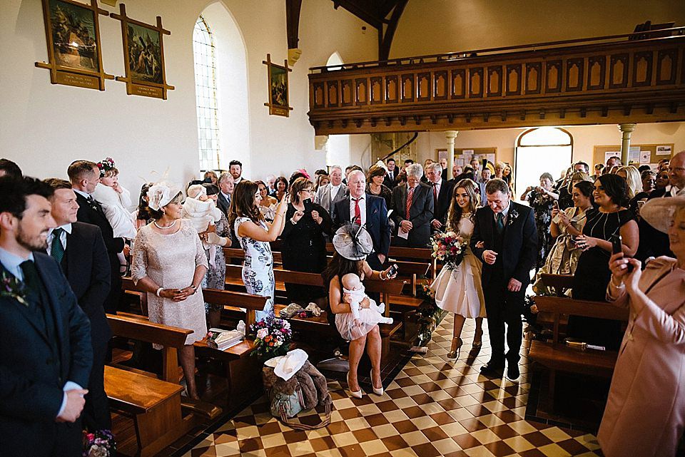 Karen wore a wedding dress with epaulettes for her Irish castle wedding in the Autumn. Photography by Epic Love.