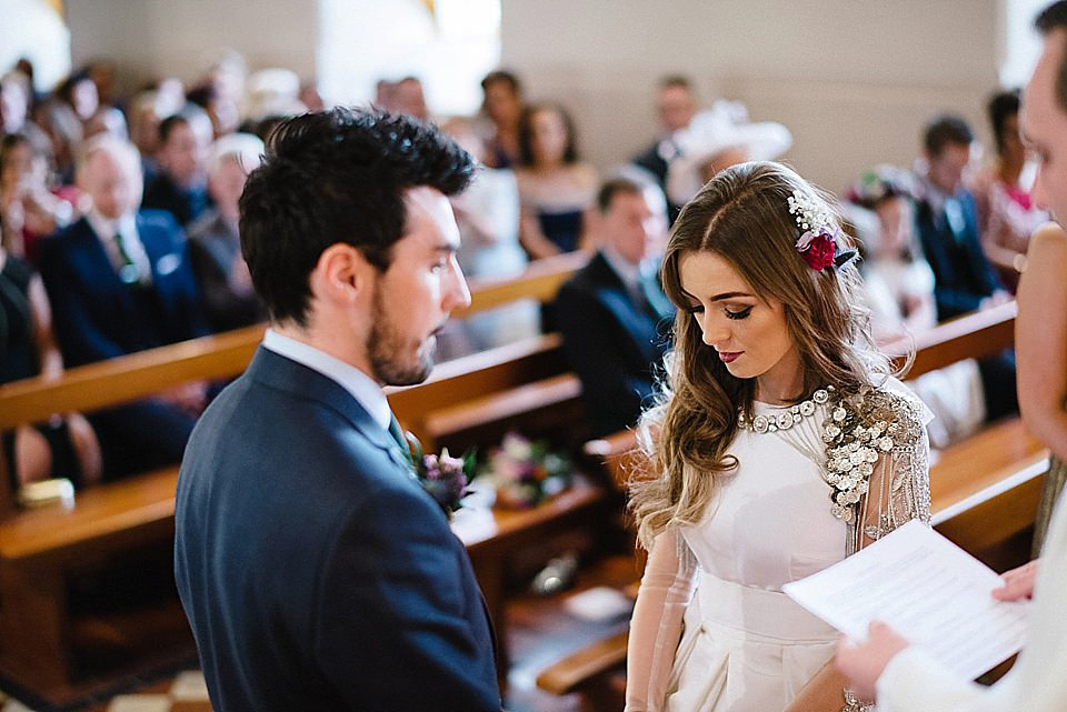 Karen wore a wedding dress with epaulettes for her Irish castle wedding in the Autumn. Photography by Epic Love.