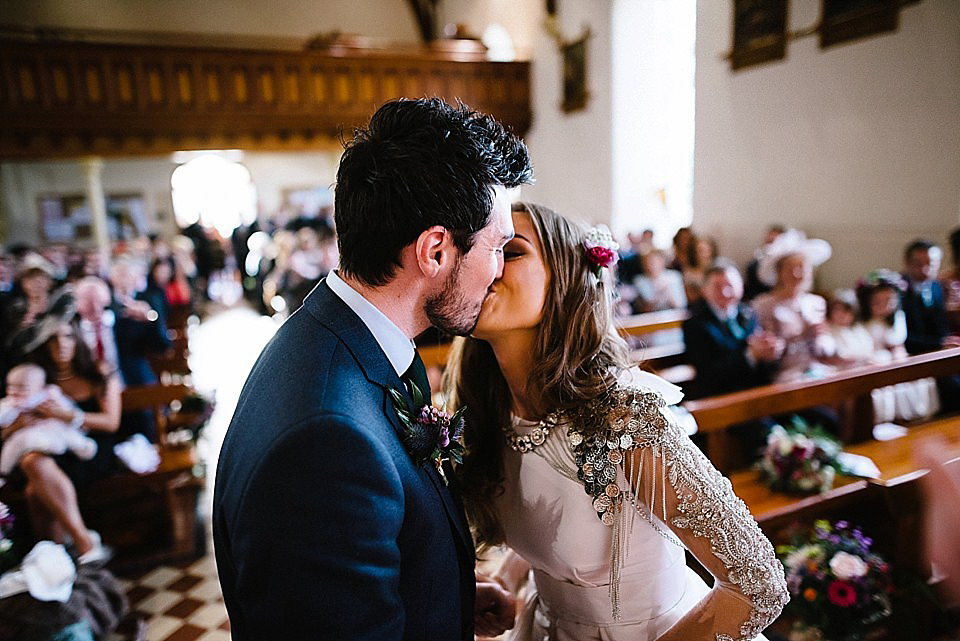 Karen wore a wedding dress with epaulettes for her Irish castle wedding in the Autumn. Photography by Epic Love.