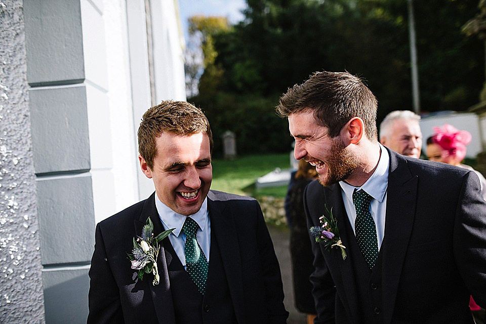 Karen wore a wedding dress with epaulettes for her Irish castle wedding in the Autumn. Photography by Epic Love.