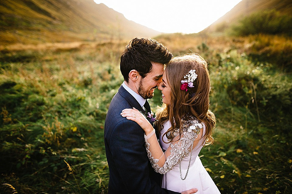 Karen wore a wedding dress with epaulettes for her Irish castle wedding in the Autumn. Photography by Epic Love.