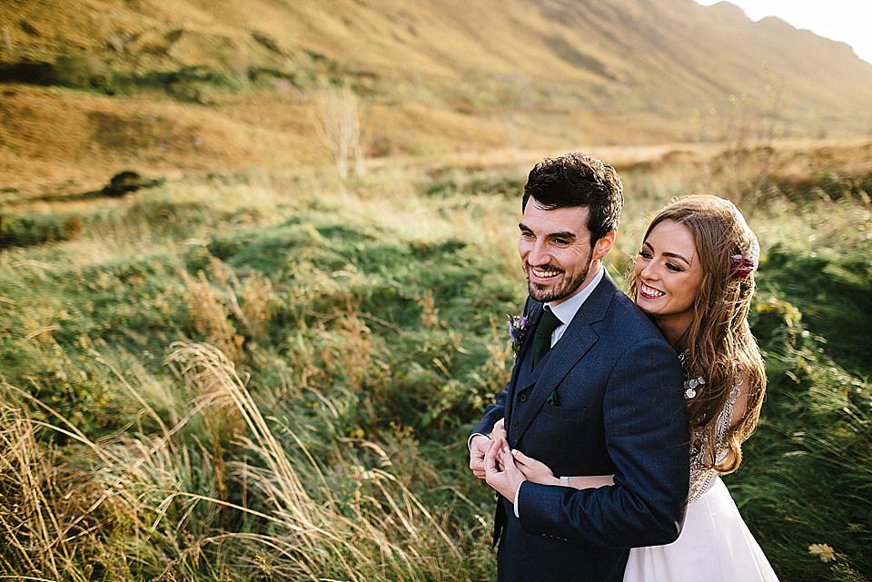 Karen wore a wedding dress with epaulettes for her Irish castle wedding in the Autumn. Photography by Epic Love.