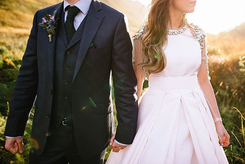 Karen wore a wedding dress with epaulettes for her Irish castle wedding in the Autumn. Photography by Epic Love.