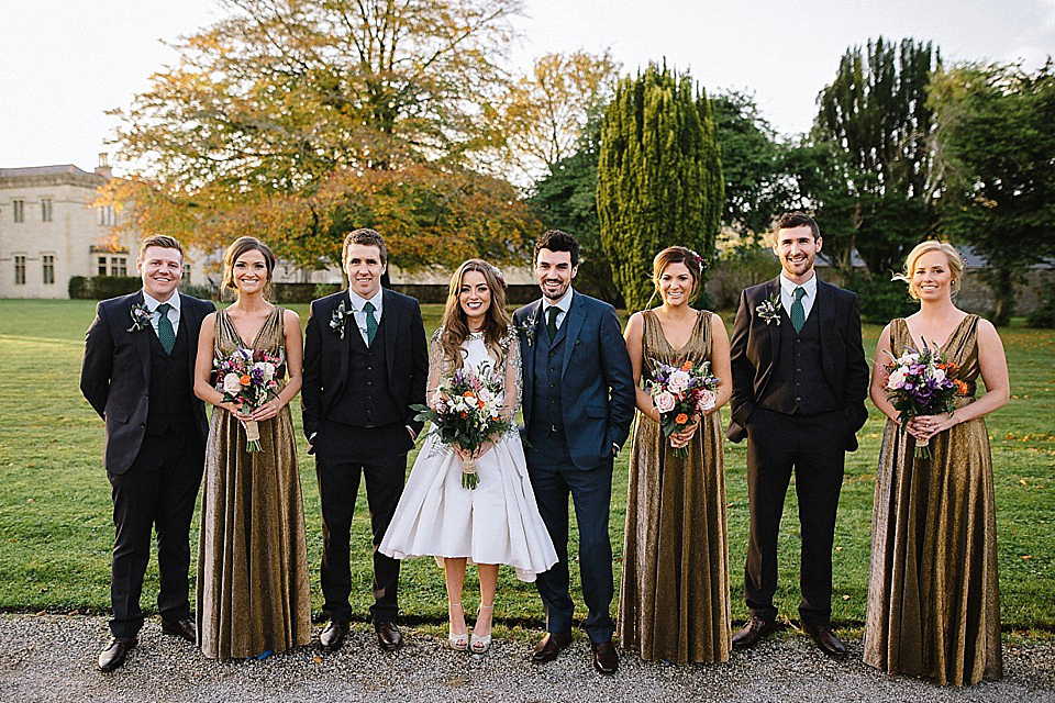 Karen wore a wedding dress with epaulettes for her Irish castle wedding in the Autumn. Photography by Epic Love.