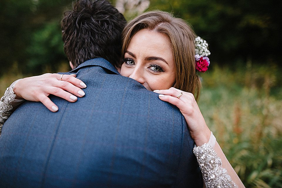 Karen wore a wedding dress with epaulettes for her Irish castle wedding in the Autumn. Photography by Epic Love.