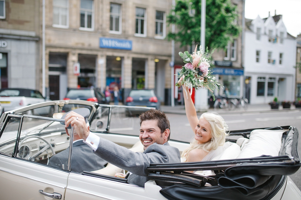 Mhairi wore an Enzoani gown for her rustic vintage inspired barn wedding in Scotland. Photography by The Gibsons.