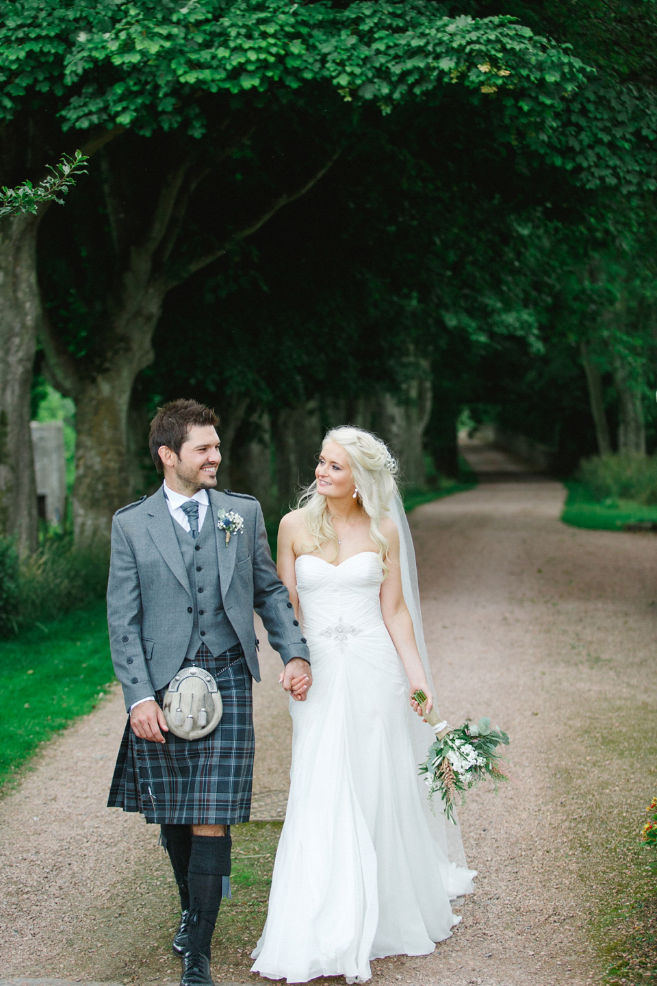 Mhairi wore an Enzoani gown for her rustic vintage inspired barn wedding in Scotland. Photography by The Gibsons.