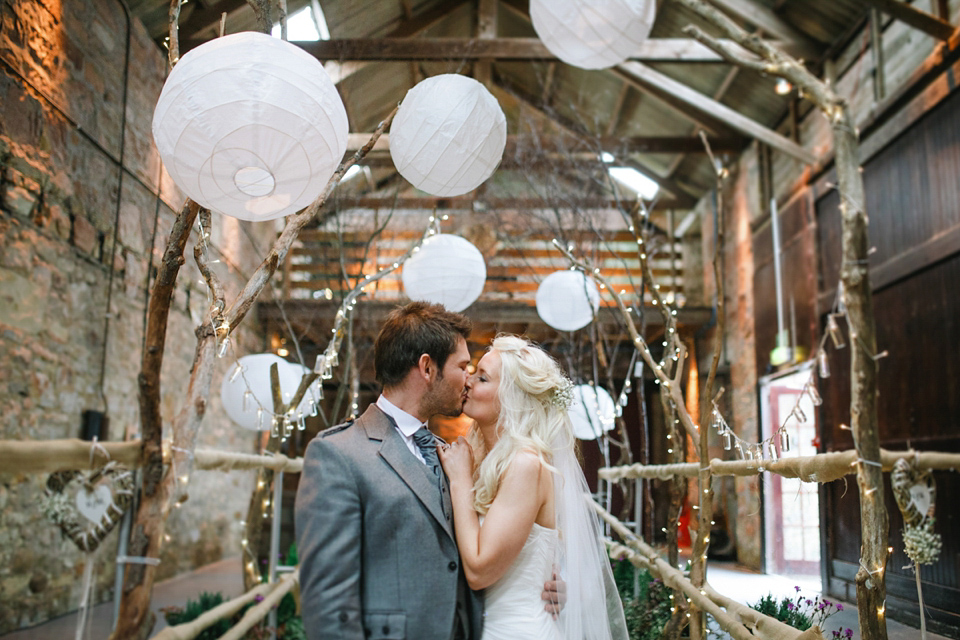 Mhairi wore an Enzoani gown for her rustic vintage inspired barn wedding in Scotland. Photography by The Gibsons.