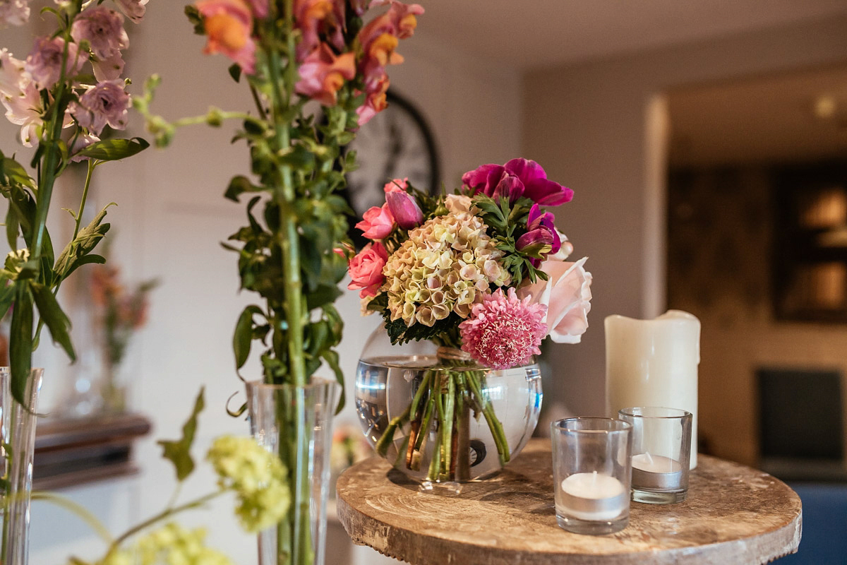 Daisy wears a Jenny Packham gown for her modern, stylish and colourful Manchester city wedding. Photography by Cassandra Lane.