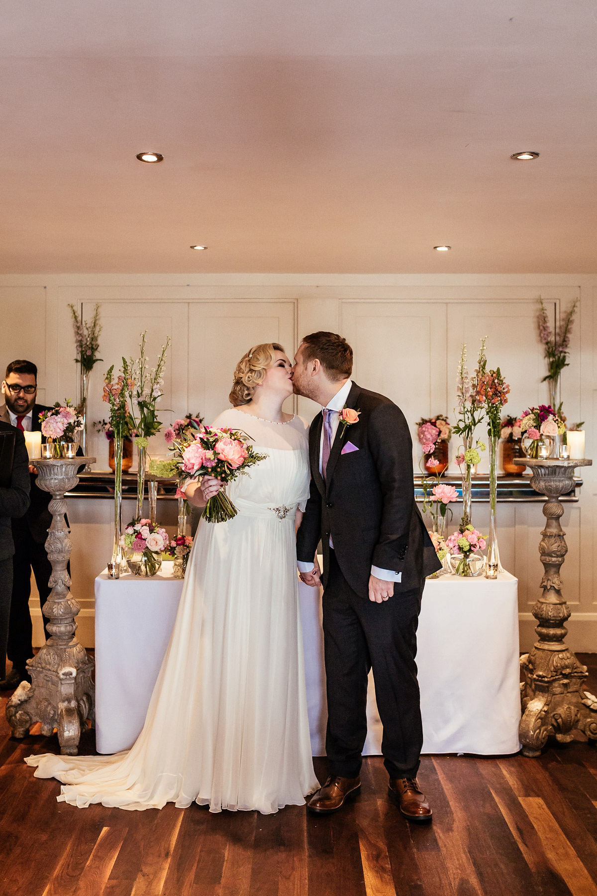 Daisy wears a Jenny Packham gown for her modern, stylish and colourful Manchester city wedding. Photography by Cassandra Lane.