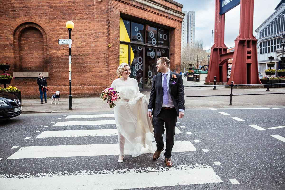 Daisy wears a Jenny Packham gown for her modern, stylish and colourful Manchester city wedding. Photography by Cassandra Lane.