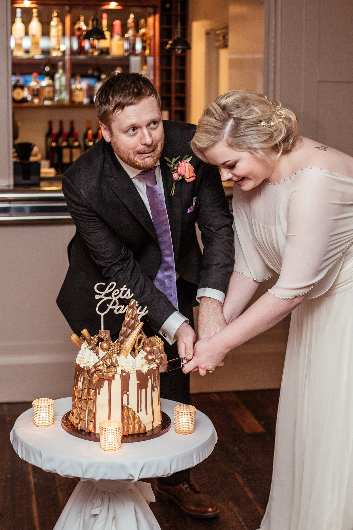 Daisy wears a Jenny Packham gown for her modern, stylish and colourful Manchester city wedding. Photography by Cassandra Lane.