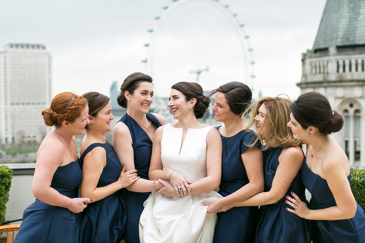 Jane wore a gown by Jesús Peiró for her chic and elegant winter wedding at the Corinthia Hotel in London. Photography by Anneli Marinovich.