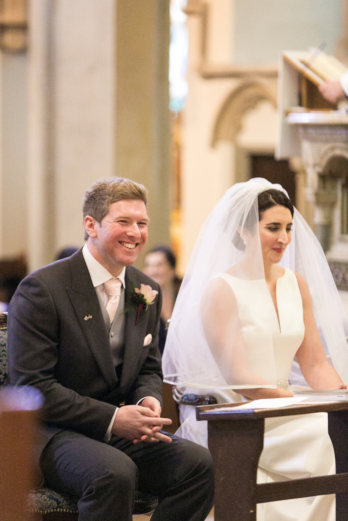 Jane wore a gown by Jesús Peiró for her chic and elegant winter wedding at the Corinthia Hotel in London. Photography by Anneli Marinovich.