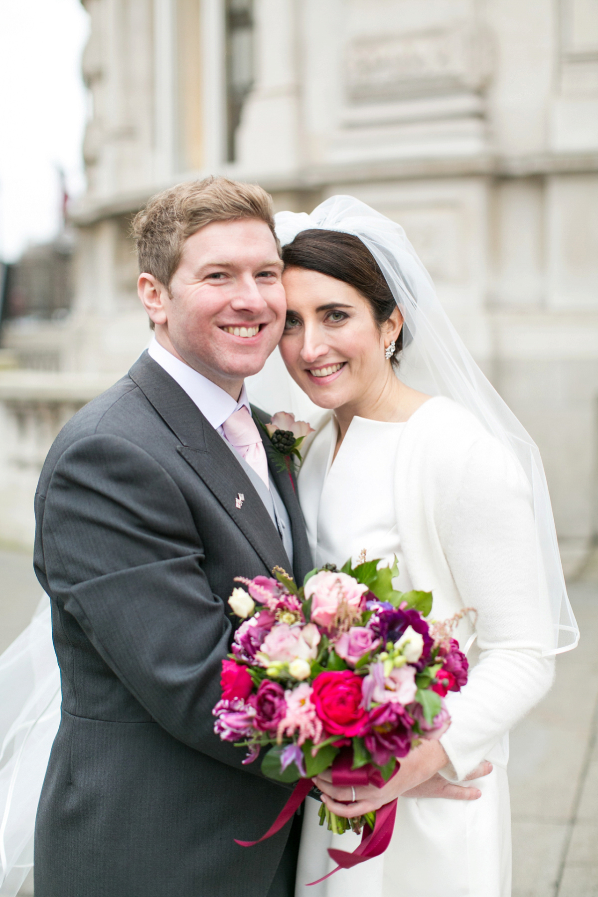 Jane wore a gown by Jesús Peiró for her chic and elegant winter wedding at the Corinthia Hotel in London. Photography by Anneli Marinovich.