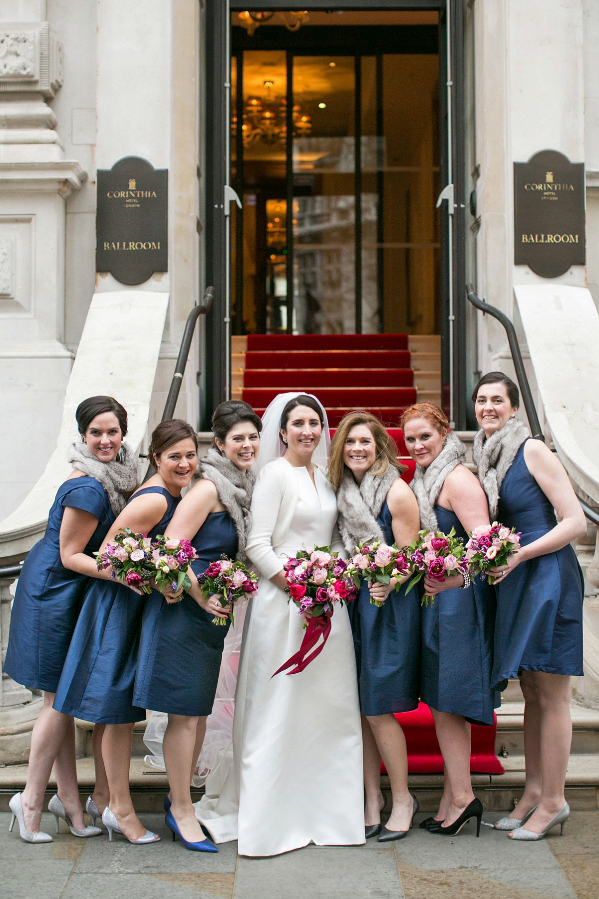 Jane wore a gown by Jesús Peiró for her chic and elegant winter wedding at the Corinthia Hotel in London. Photography by Anneli Marinovich.