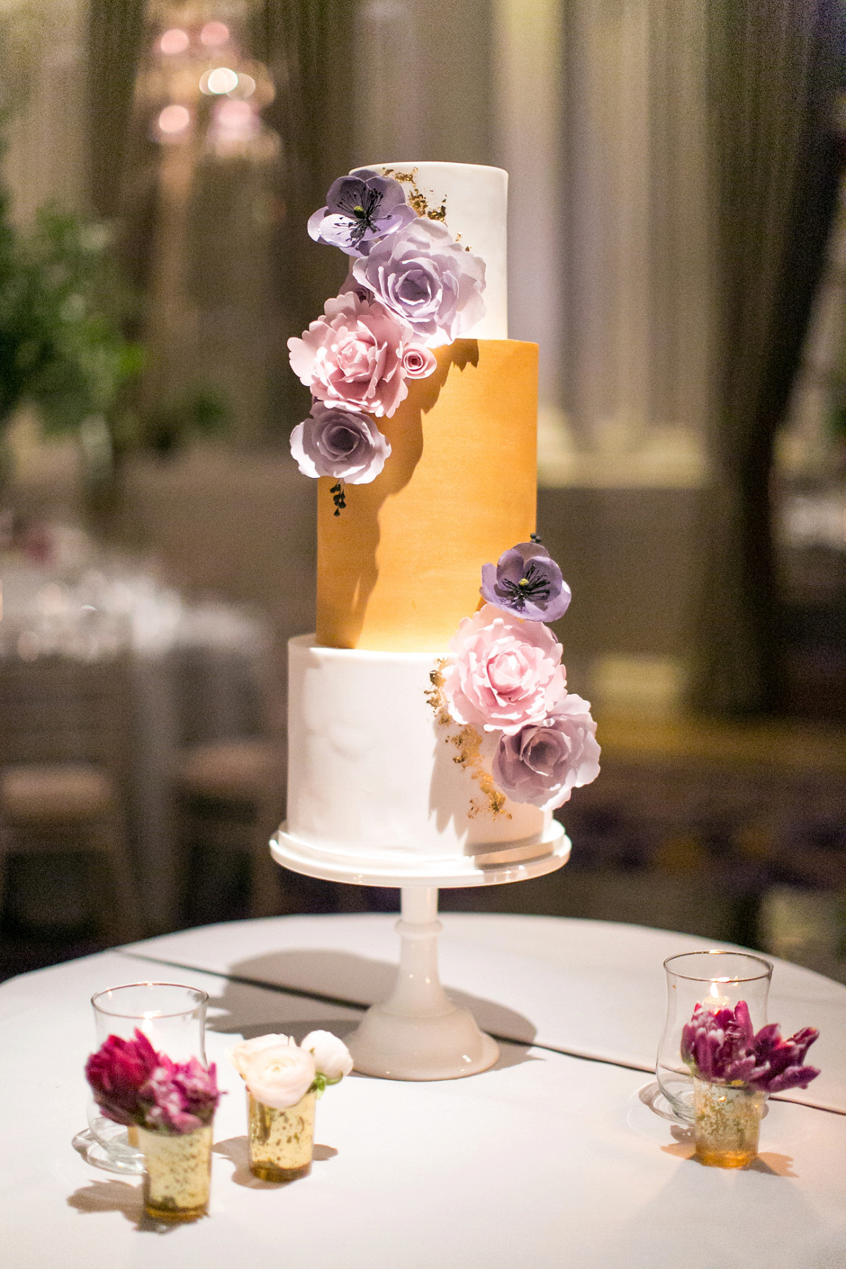 Jane wore a gown by Jesús Peiró for her chic and elegant winter wedding at the Corinthia Hotel in London. Photography by Anneli Marinovich.