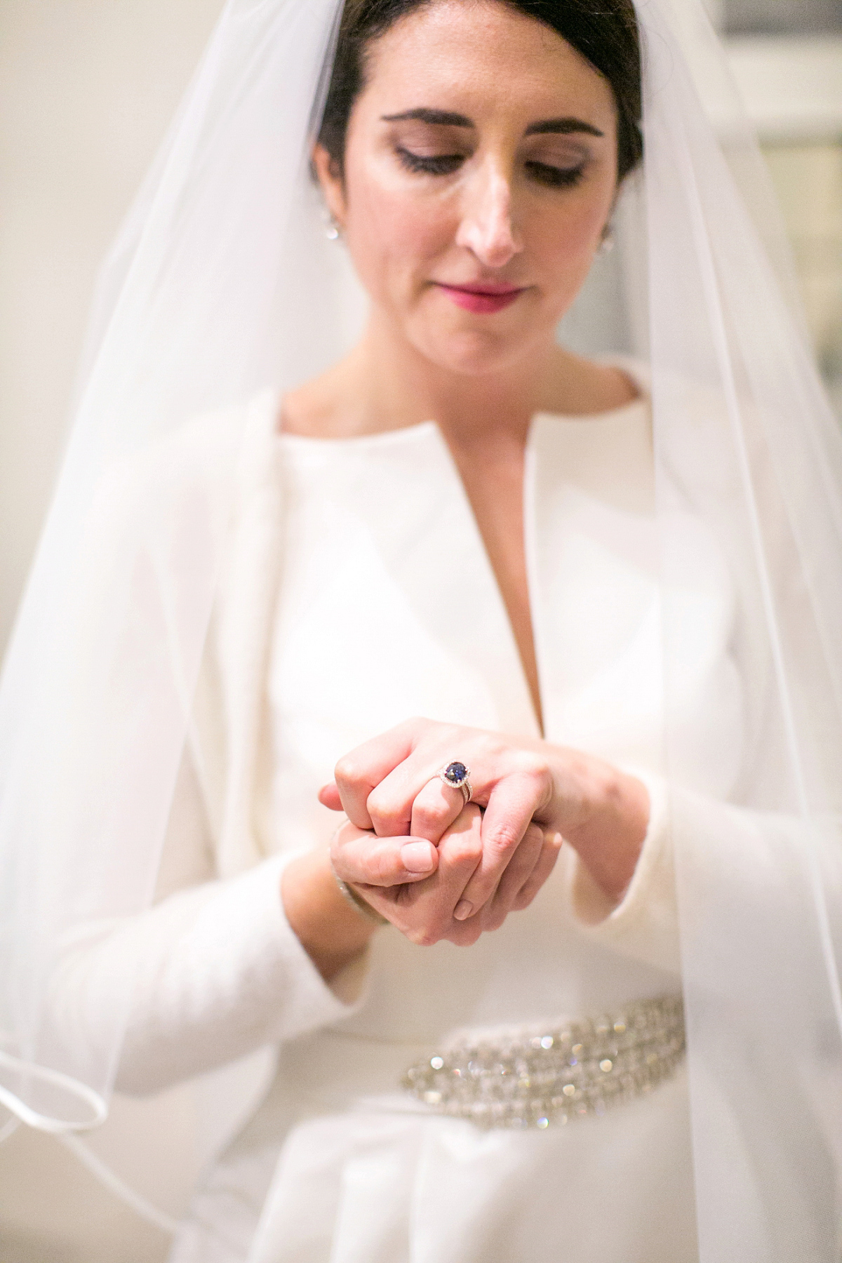 Jane wore a gown by Jesús Peiró for her chic and elegant winter wedding at the Corinthia Hotel in London. Photography by Anneli Marinovich.