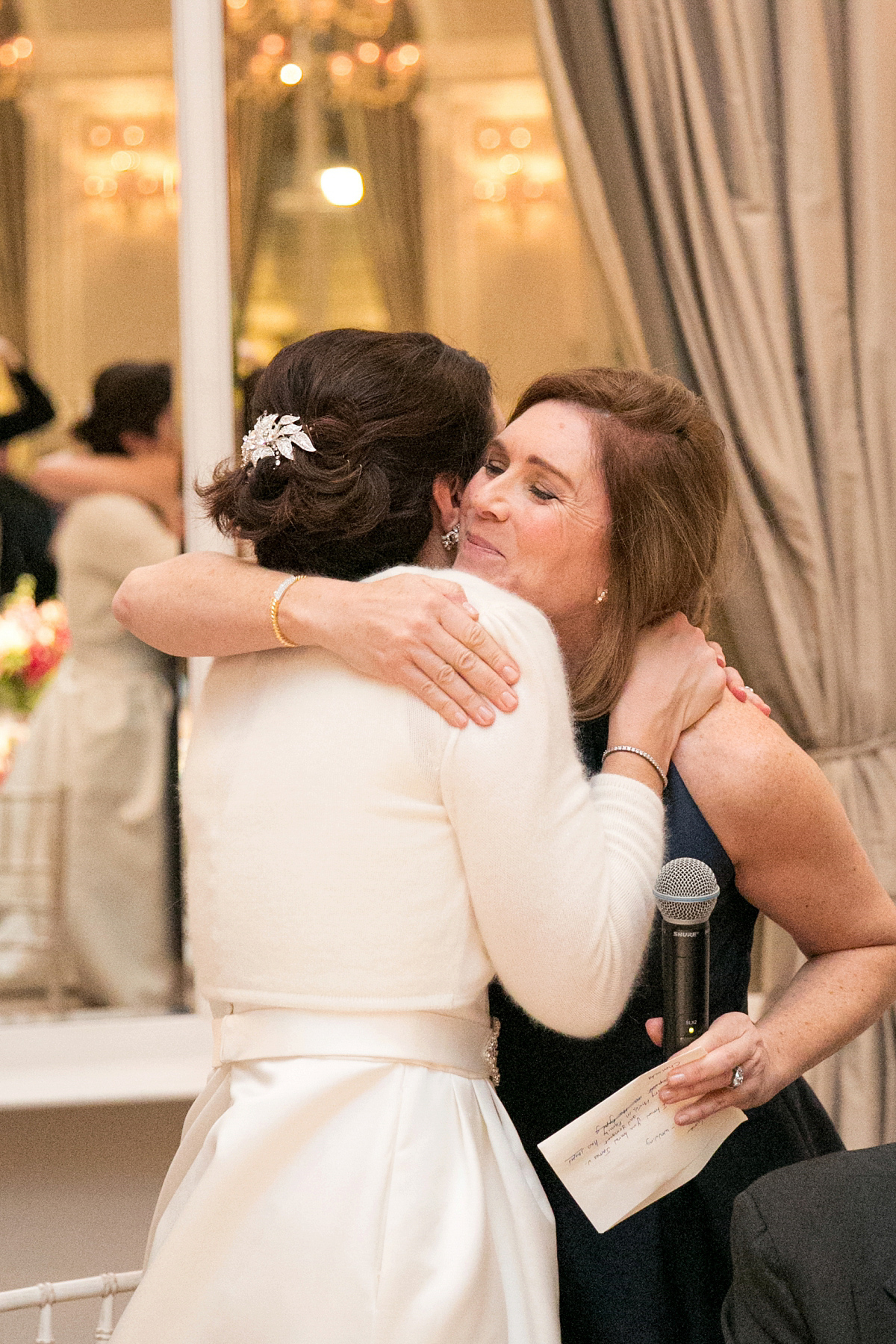 Jane wore a gown by Jesús Peiró for her chic and elegant winter wedding at the Corinthia Hotel in London. Photography by Anneli Marinovich.